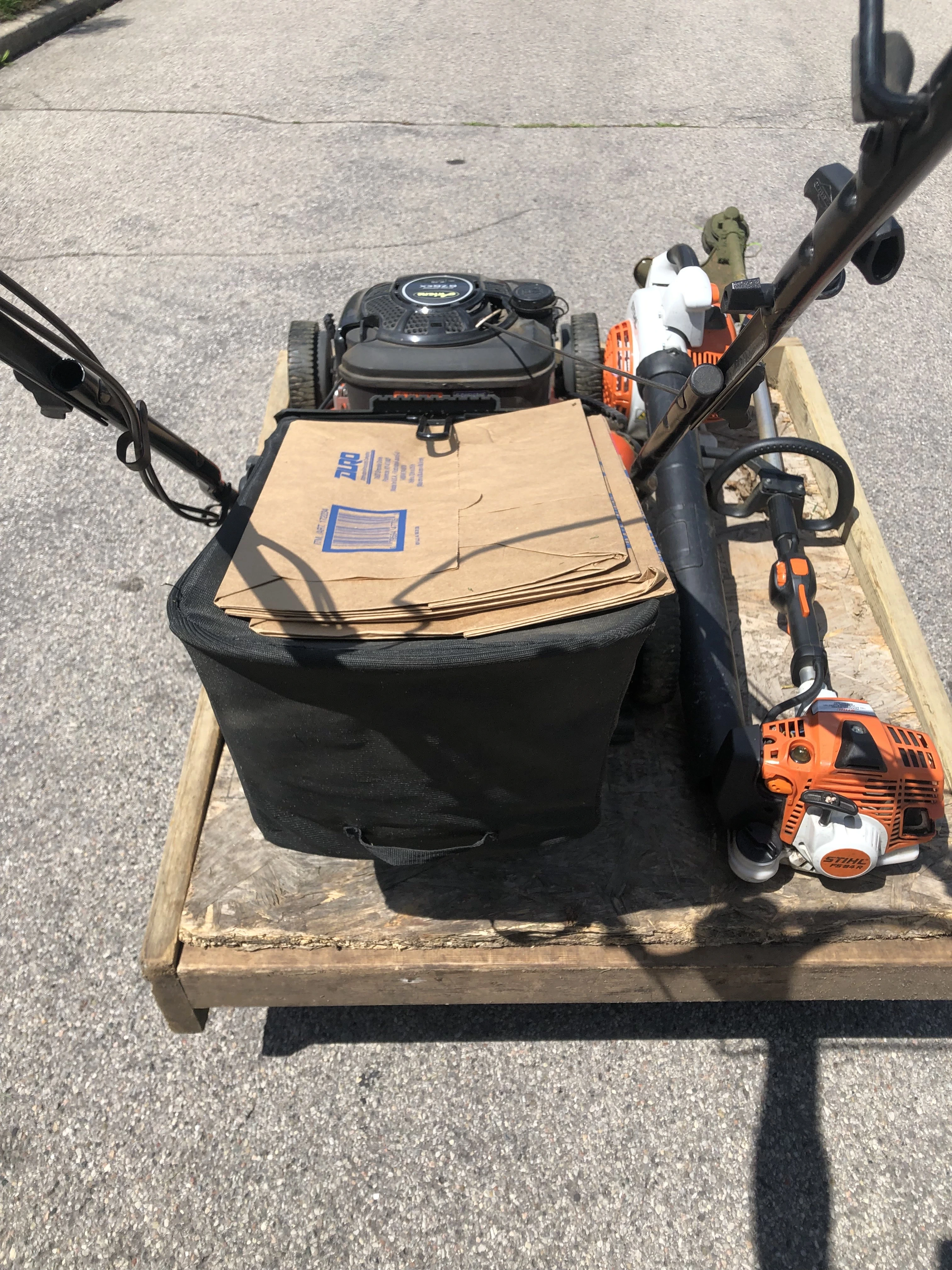 Professional lawn maintenance service in Toronto showing expert mowing technique